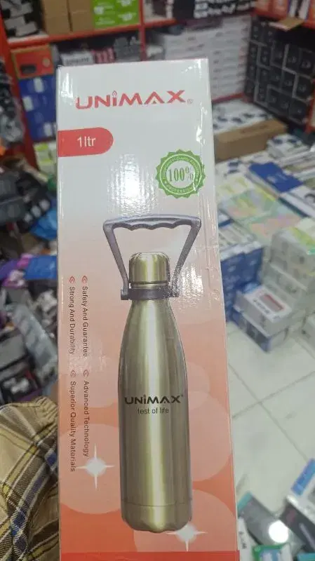 Unimax branded 1-liter stainless steel vacuum flask comes in a gold finish with a carrying handle.