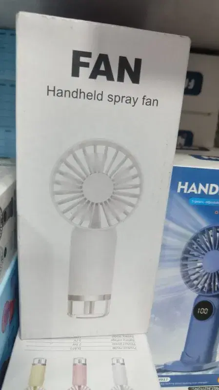 portable handheld spray fan featuring a USB-rechargeable design.