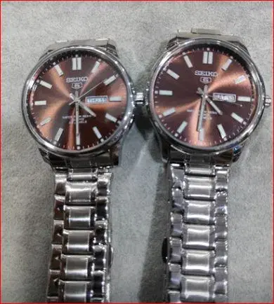 Seiko 5 automatic watches with distinct chocolate or sunburst brown dials and stainless steel bracelets