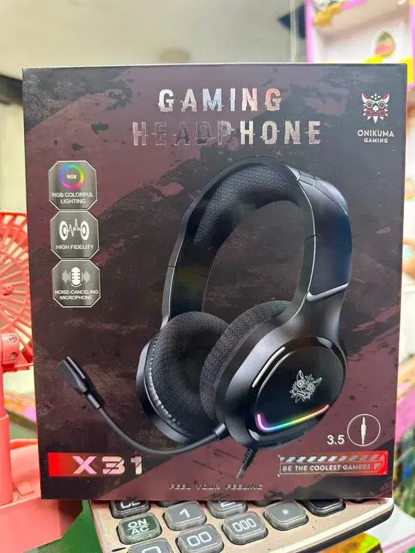 X31 is a gaming headset featuring RGB colorful lighting and a noise-canceling microphone.
