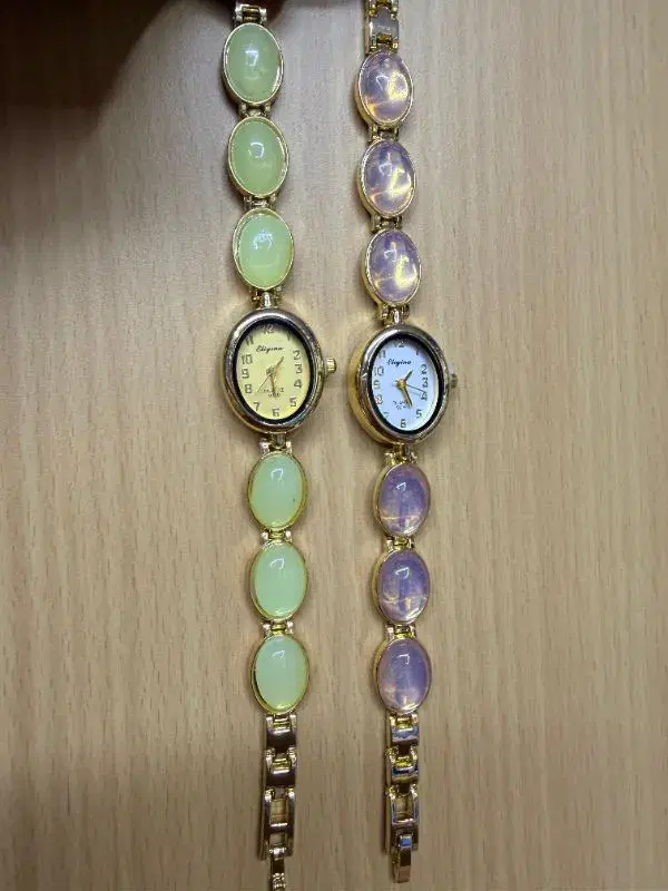 a women's quartz watch features a distinctive lavender-colored stone bracelet strap.