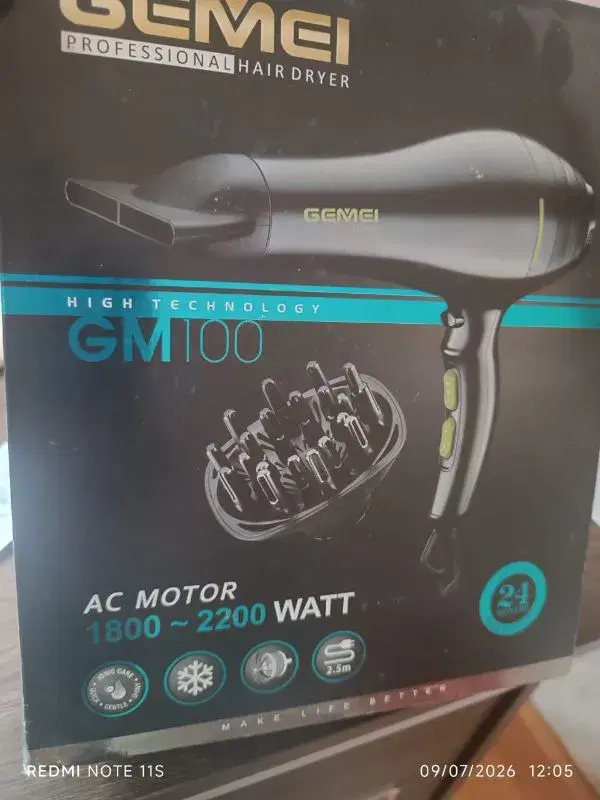 Gemei GM100 Professional Hair Dryer, featuring a powerful AC motor with a power range of 1800 to 2200 Watts.